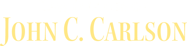 Law Offices of John C. Carlson Logo